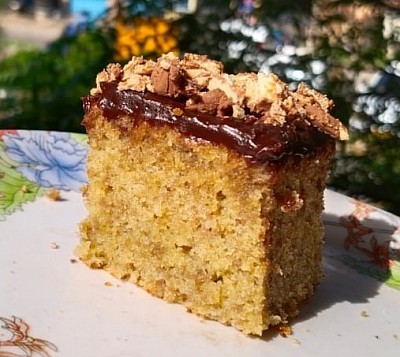 banana cake with chocolate butter cream topped with wafers